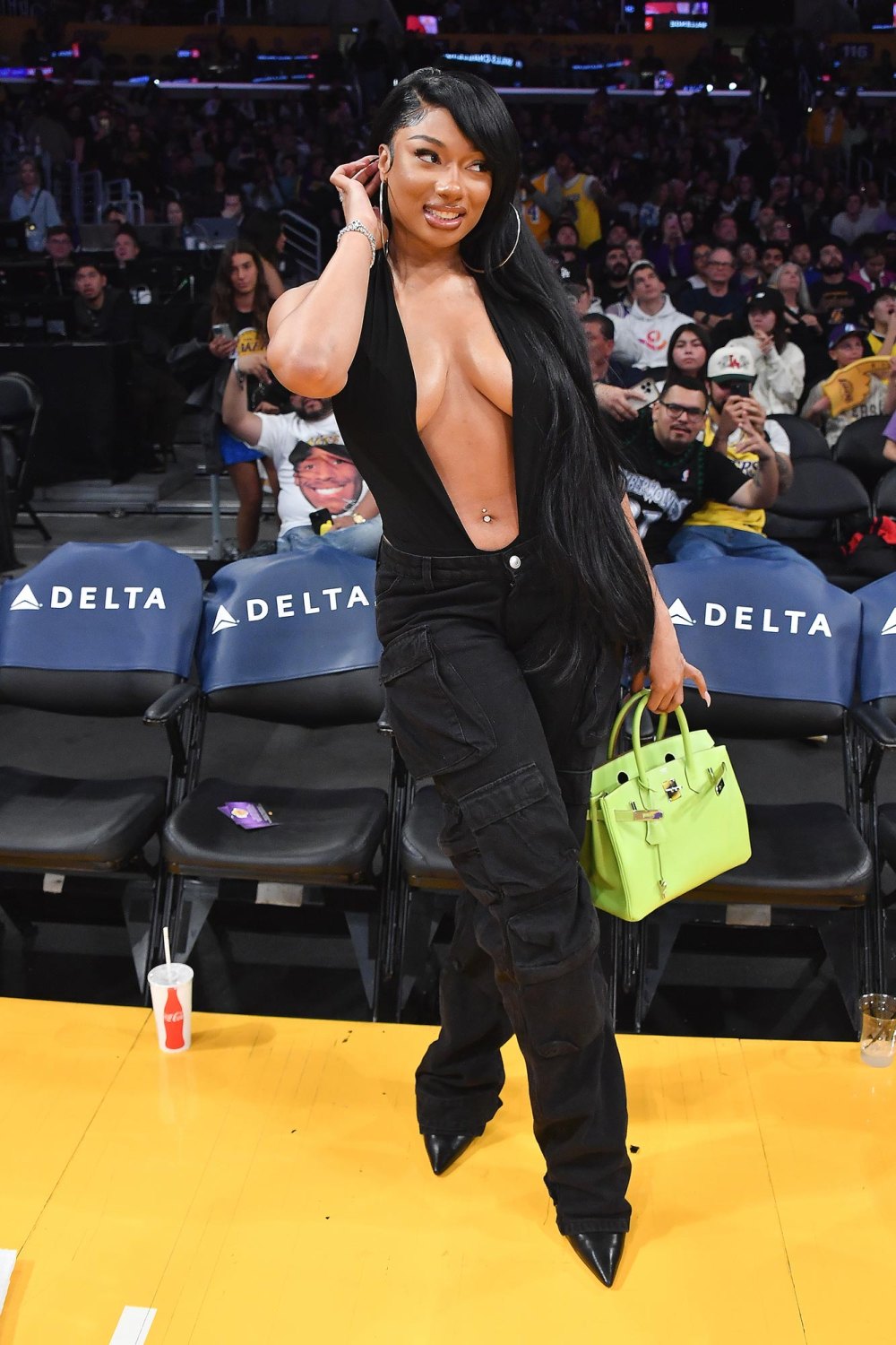 Megan Thee Stallions Courtside Style Includes a Daringly Low Top and a Lime Green Birkin