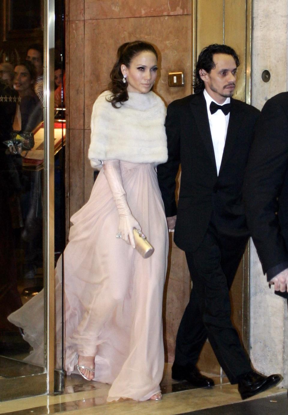 Jennifer Lopez and her then-husband Marc Anthony leaving a hotel.