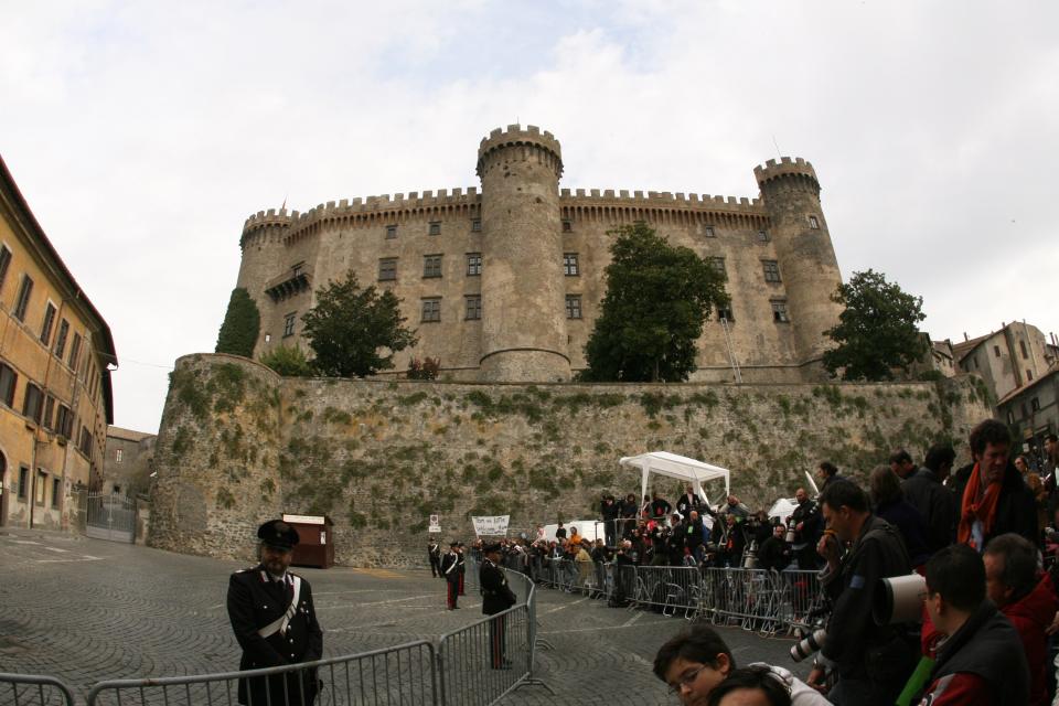 Fans and media outside the castle.