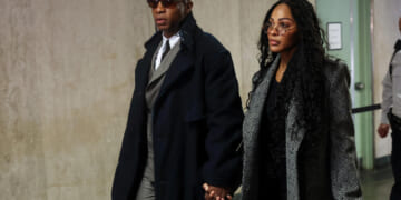 Jonathan Majors arrives for domestic violence trial with Meagan Good at his side and a Bible in hand. 'That is not by mistake,' says legal expert.